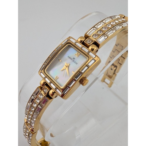 Anne Klein Watch Women 17mm Gold Tone MOP Dial Crystal Bling Tank 7" New Battery - Picture 2 of 8